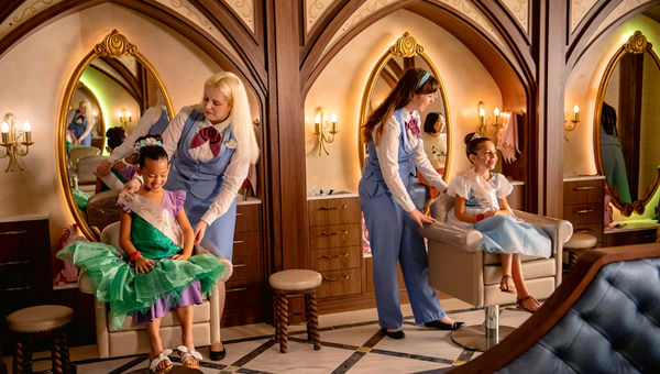 At Bibbidi Bobbidi Bou que, Fairy Godmother’s Apprentices will provide an enchanted salon experience catered to younger guests aged 3 to 12. At Bibbidi Bobbidi Bou que, Fairy Godmother’s Apprentices will provide an enchanted salon experience catered to younger guests aged 3 to 12.