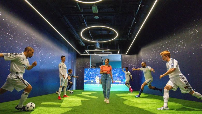 Real Madrid World features roller coasters and interactive exhibits.