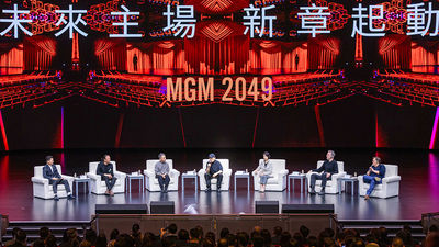 Directed by acclaimed filmmaker Zhang Yimou (centre), Macau 2049 is a grand production that fuses technology and art.