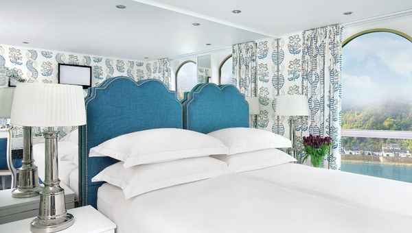 Trafalgar Verity is a 128-guest ship cruising the Rhine, featuring 1930s-inspired design, curated local experiences, sustainable practices, and inclusive dining with wine, beer, and daily excursions.